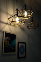 a light fixture with a picture of a man and a woman