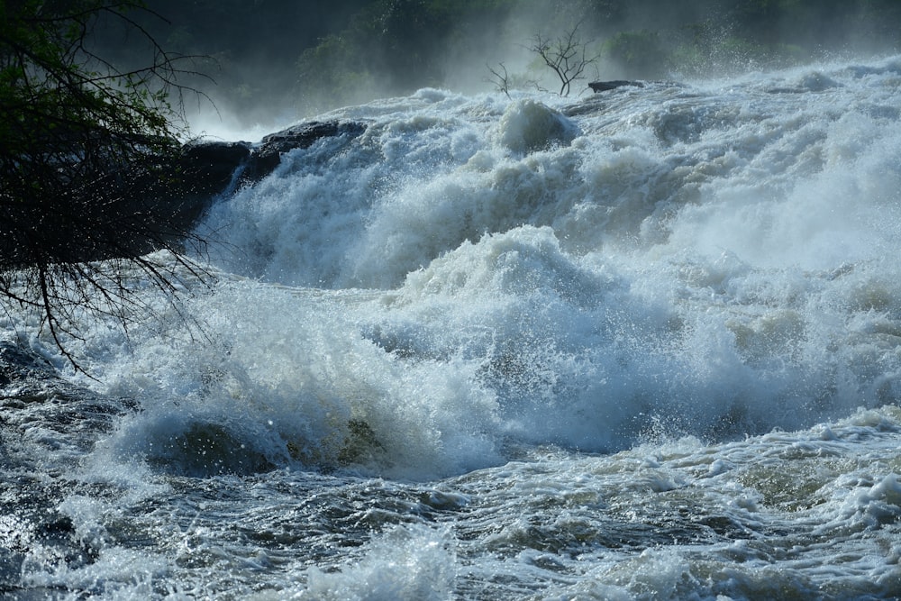 a river with a waterfall