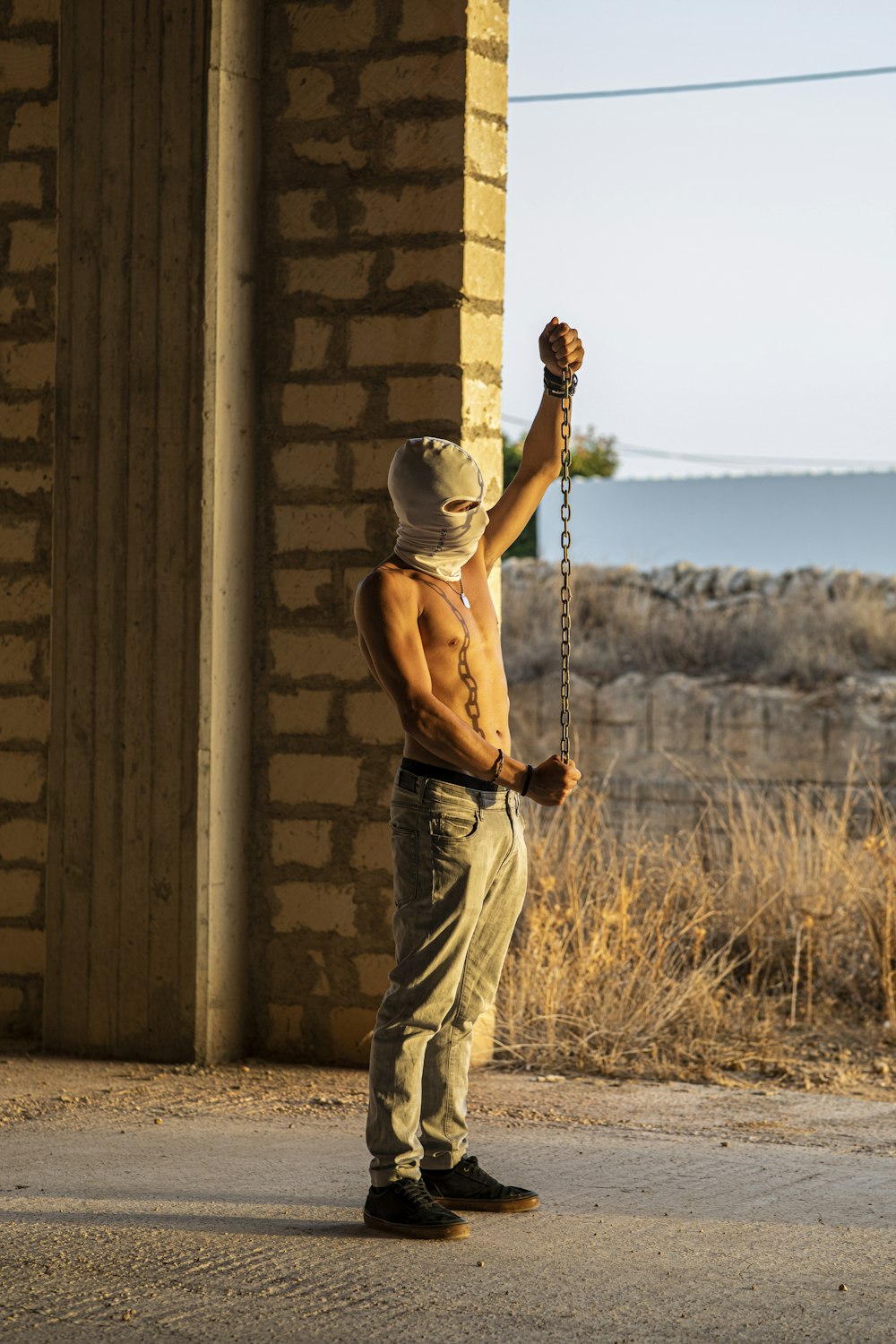 a man holding a fishing pole