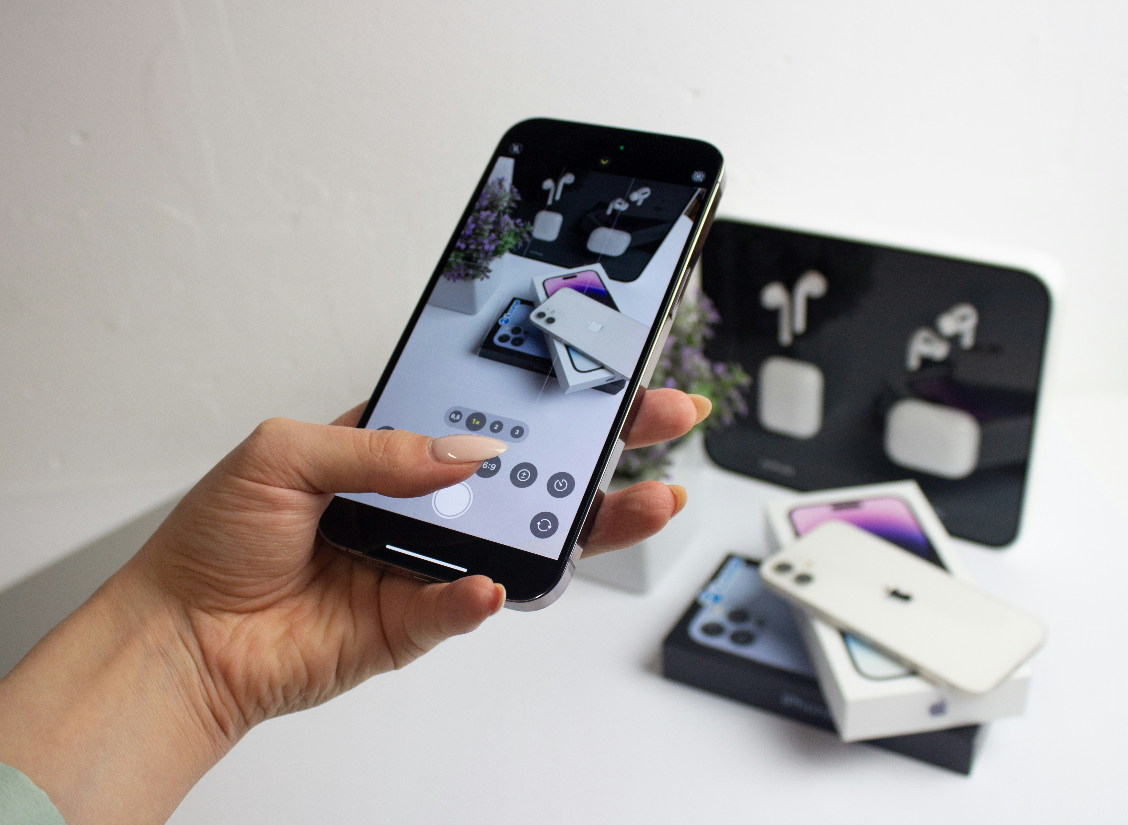 a hand holding a phone