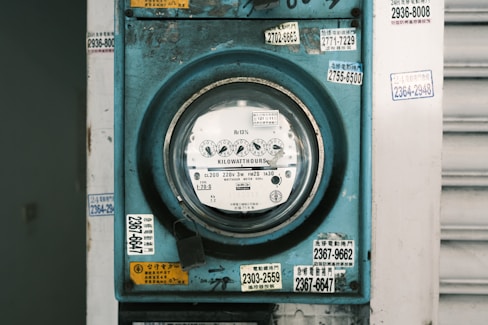 a green and white meter