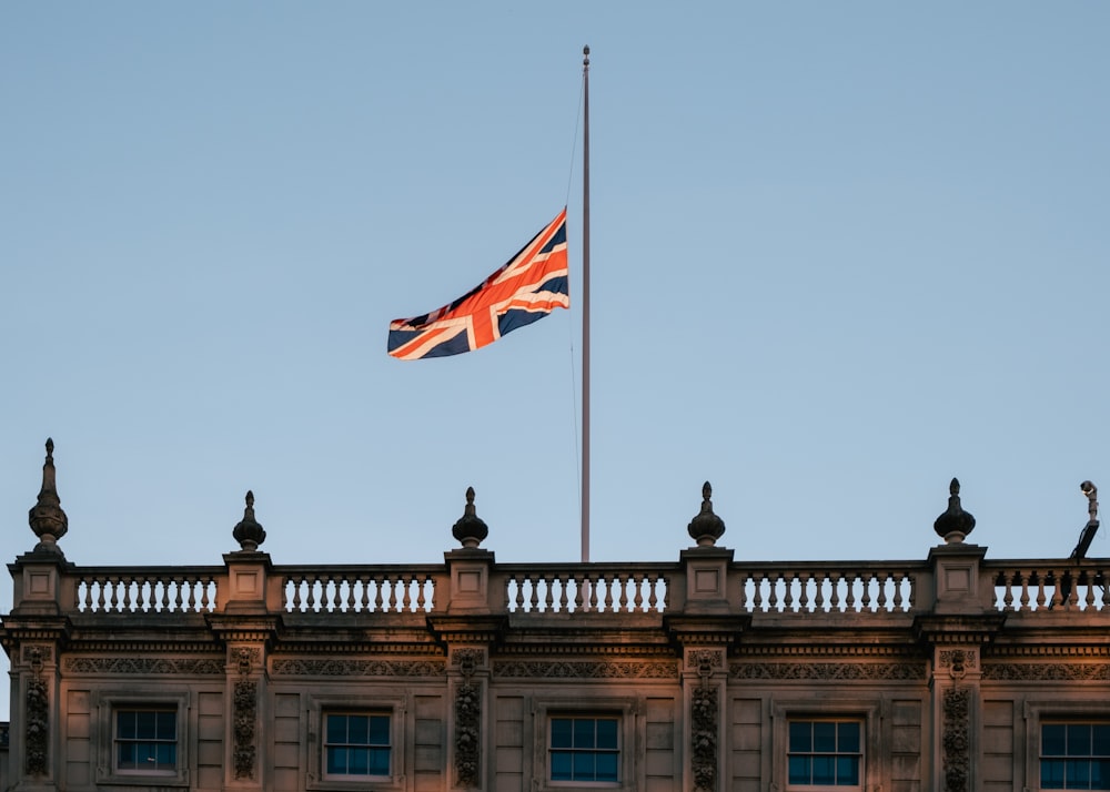 a flag flying on a building