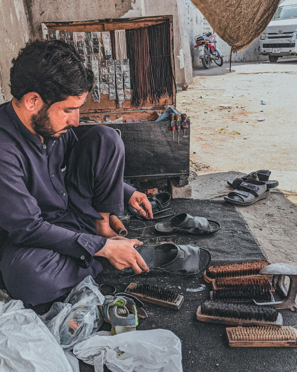 a man sitting on the ground