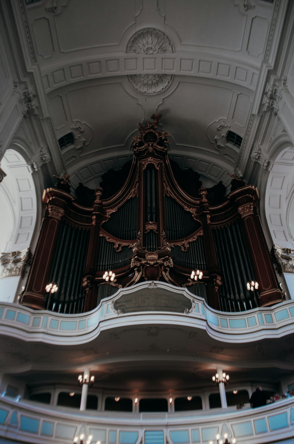 a large ornate ceiling with a large organ