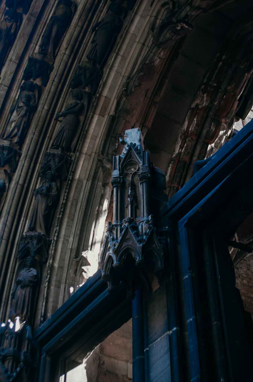 a large ornate ceiling with statues