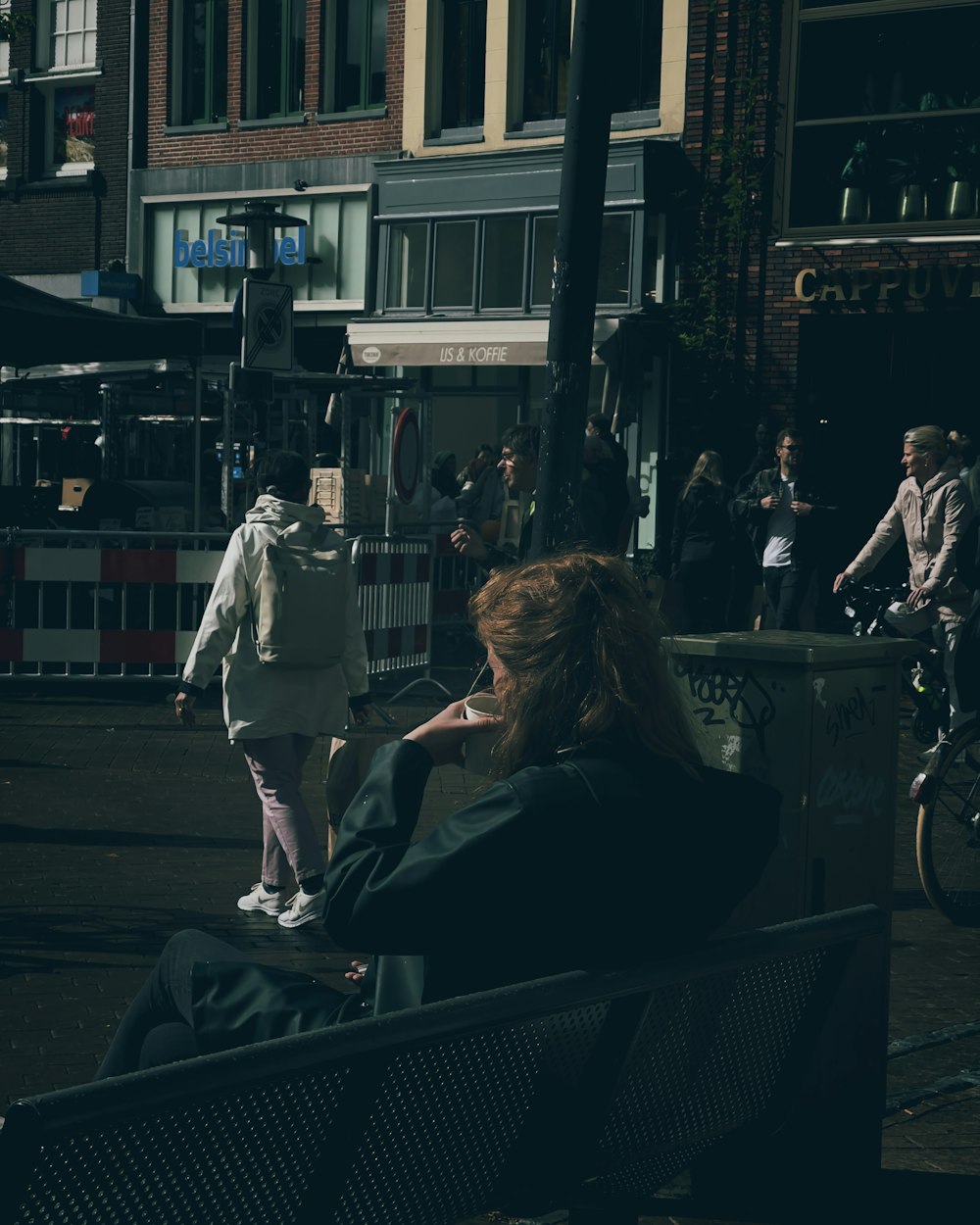 a person sitting on a bench