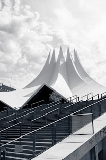 a large white building with stairs