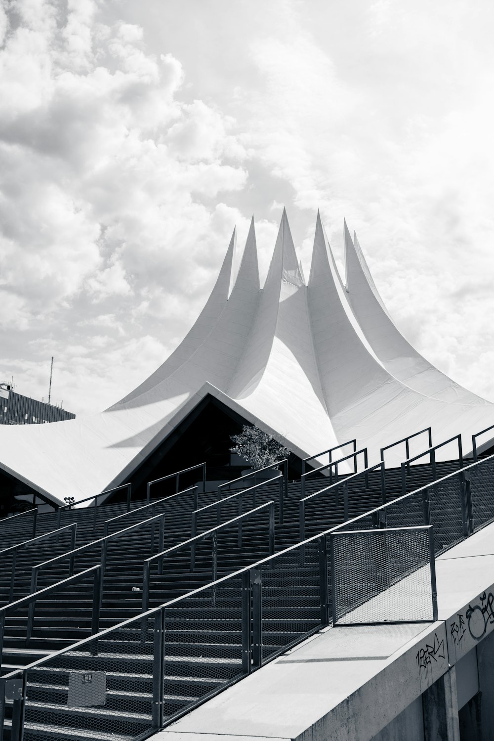 a large white building with stairs