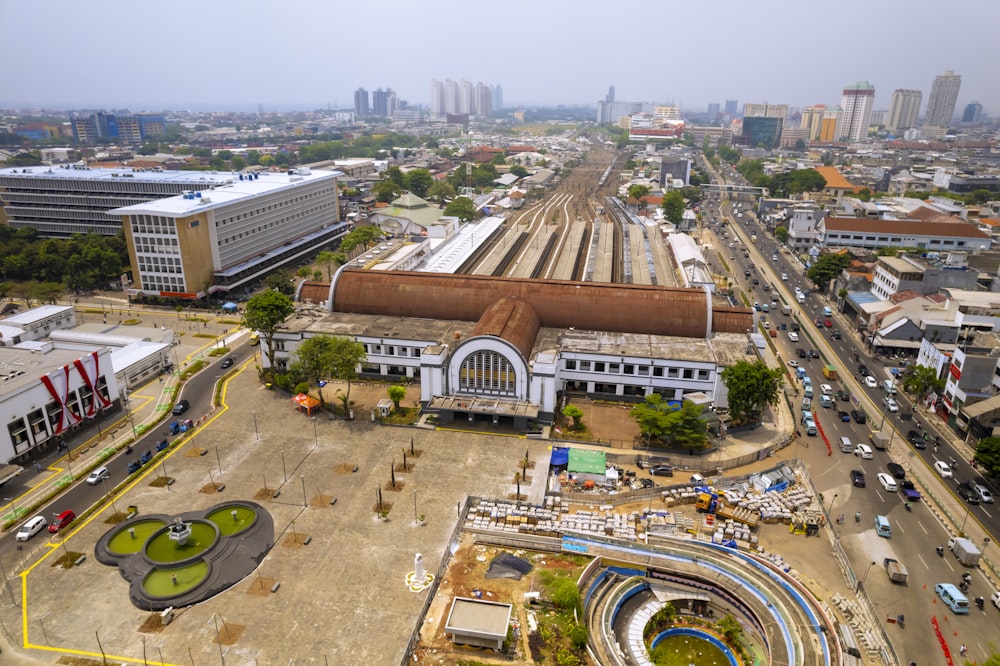 a large building with a dome and a road in front of it