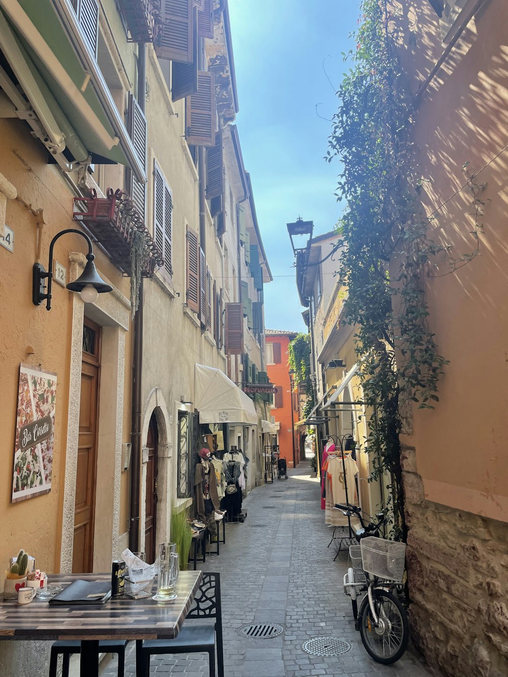 a narrow street with buildings on both sides