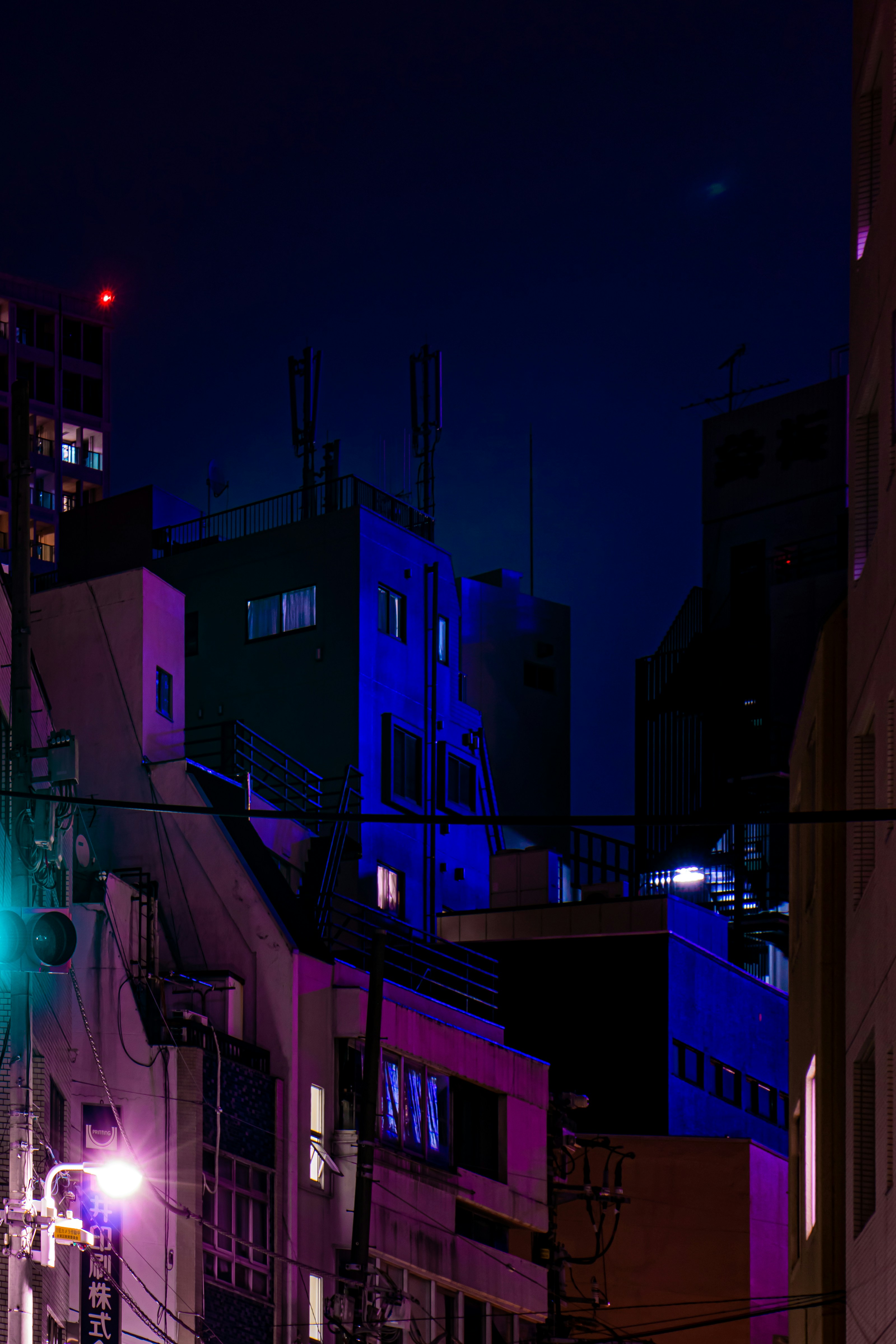 a group of buildings with lights