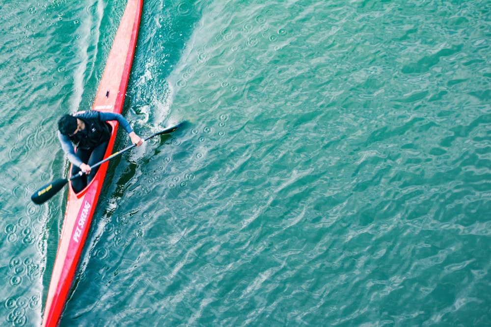 a person parasailing in the water