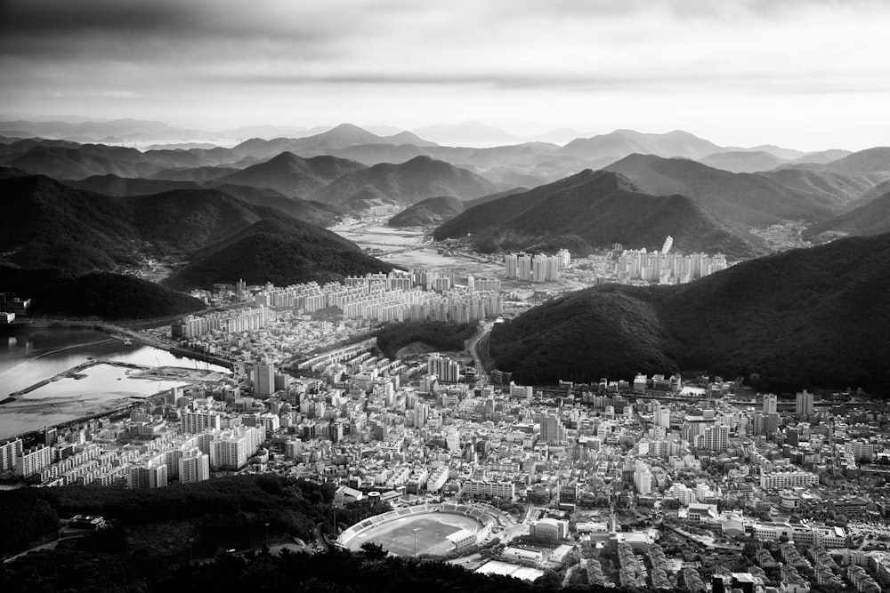 a city with mountains in the background