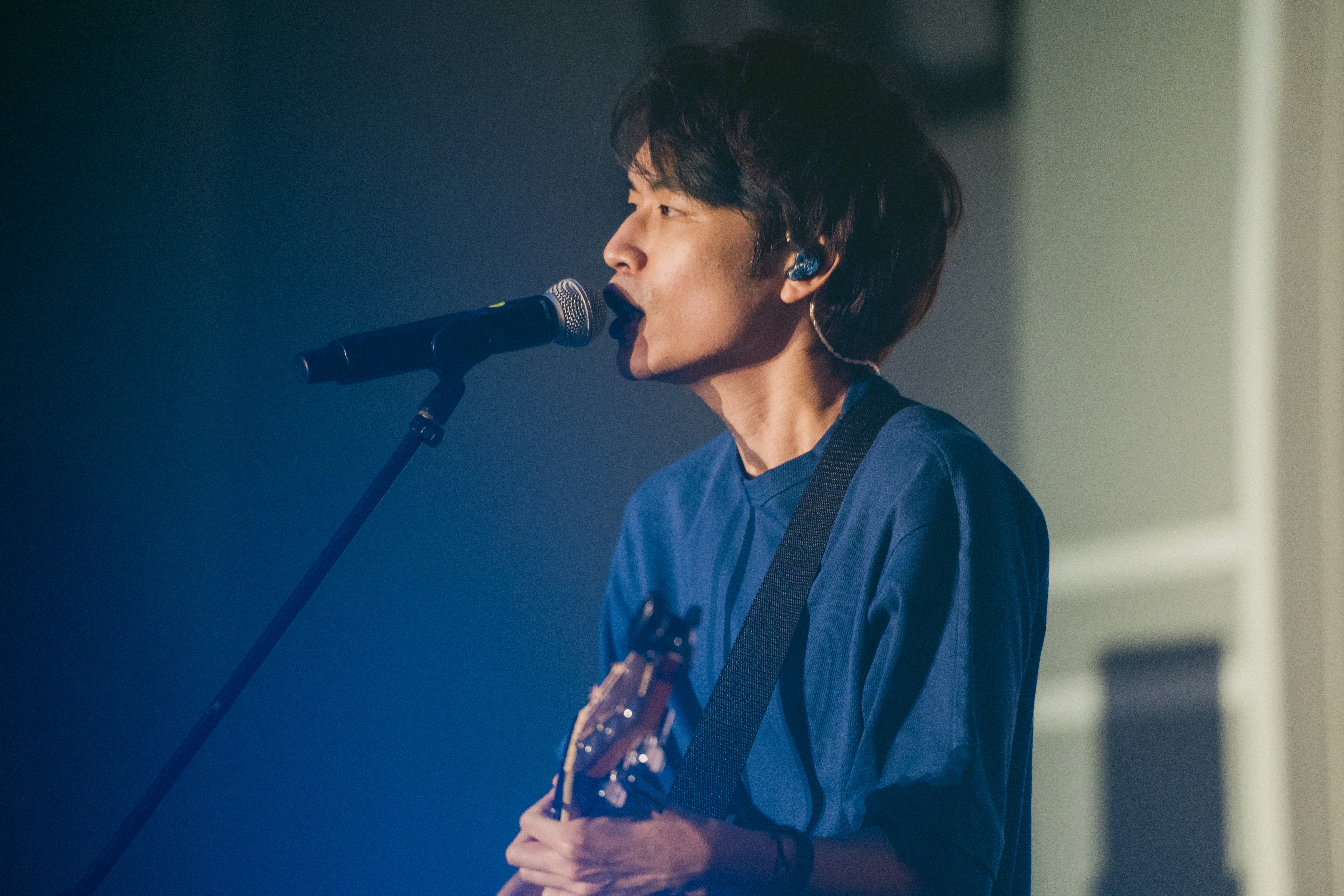 a man playing guitar