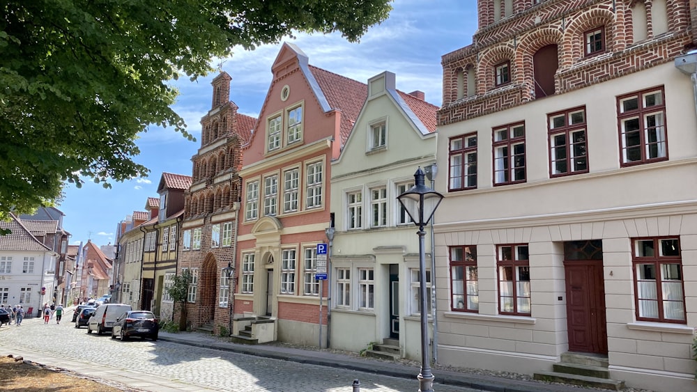 a street with cars and buildings on the side