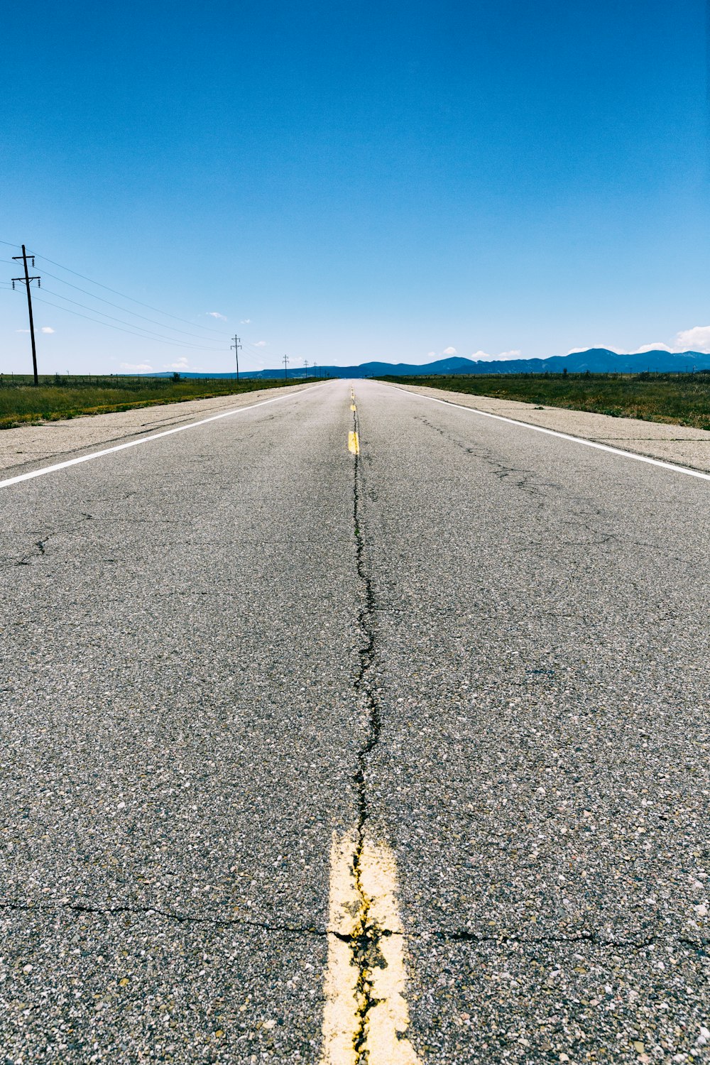 a road with a crack in the middle