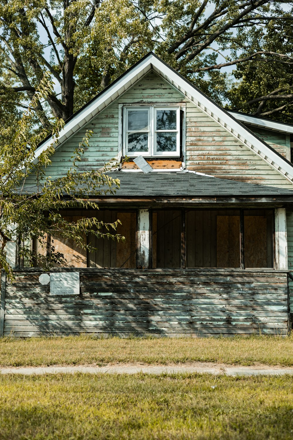 a house with a tree in the front