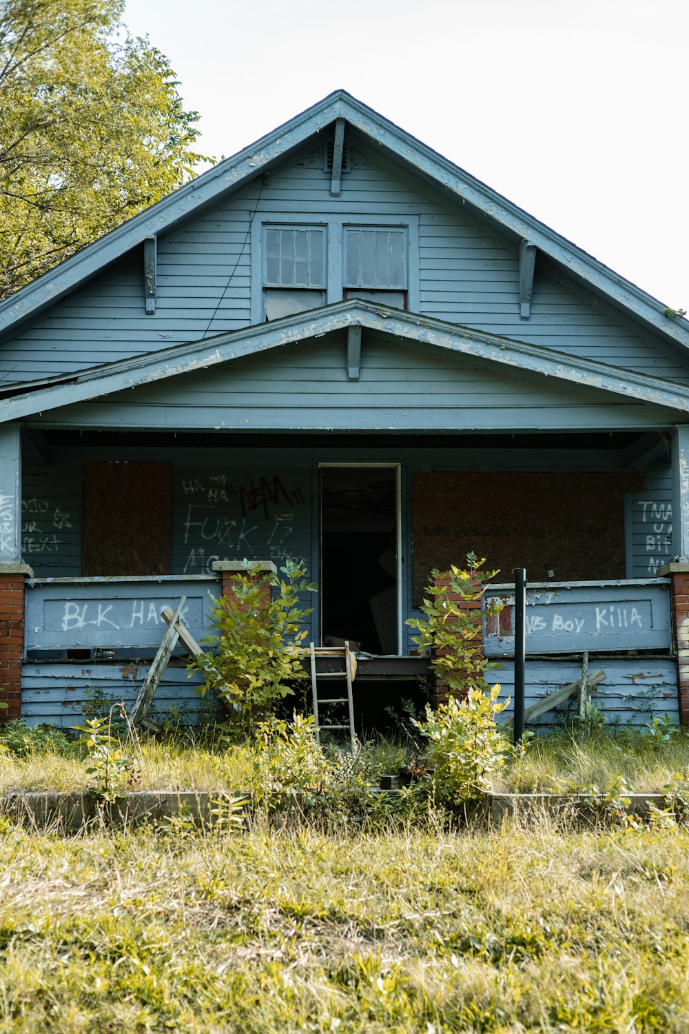 a house with a sign in front