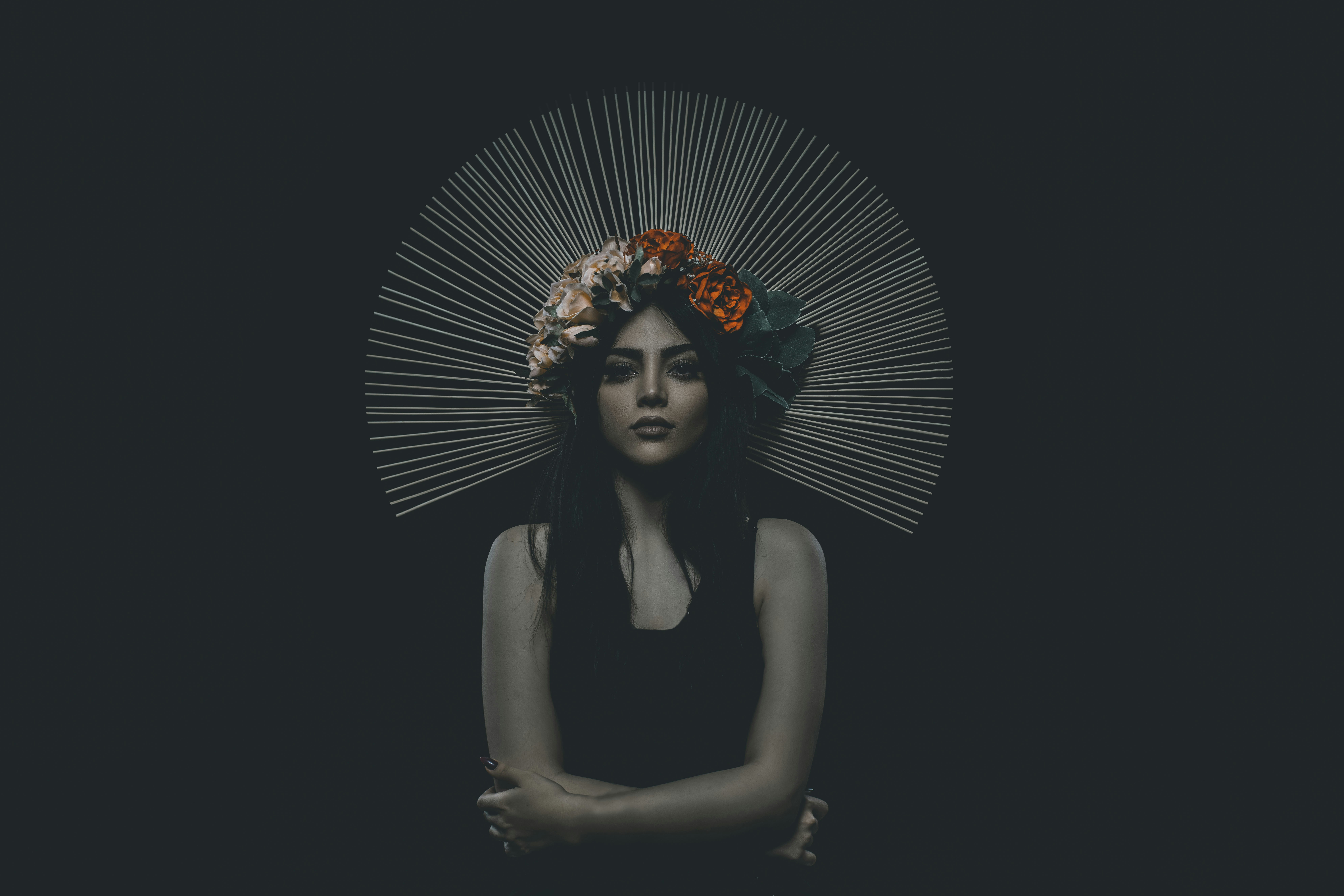 A woman with a hat and a flower in her hair photo – Free Apparel Image ...