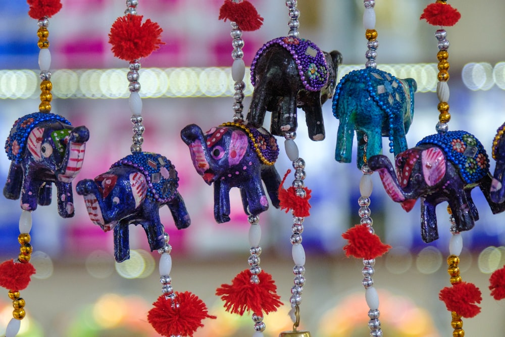 a group of elephants stand near each other