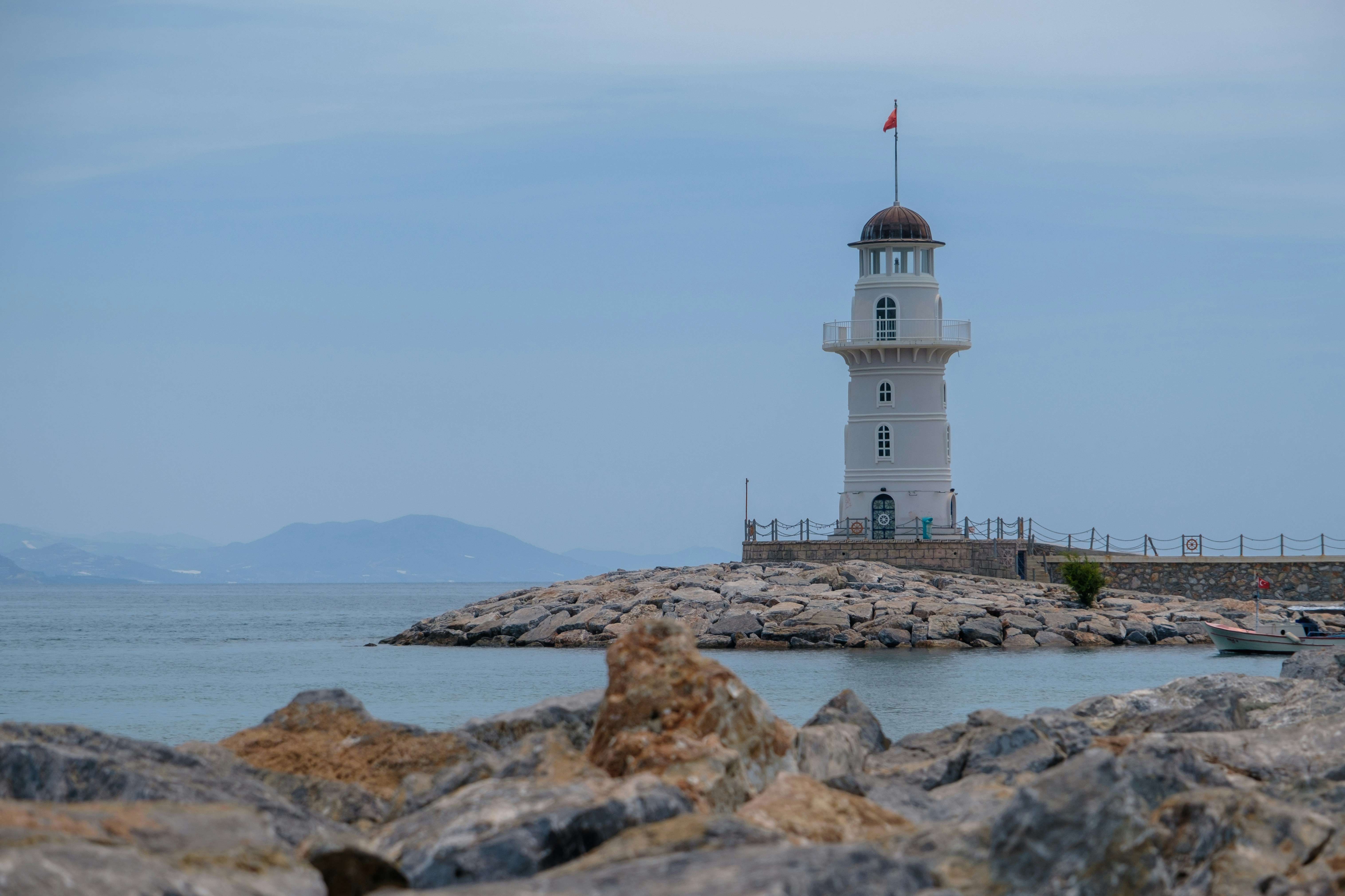 a lighthouse on a rocky shore