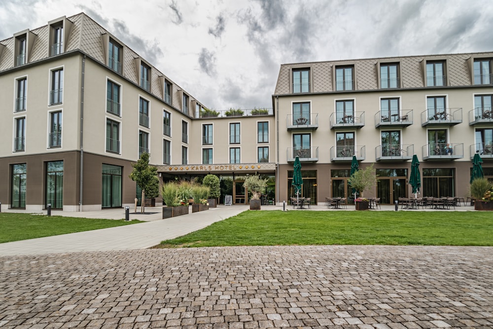 a building with a lawn and a path in front