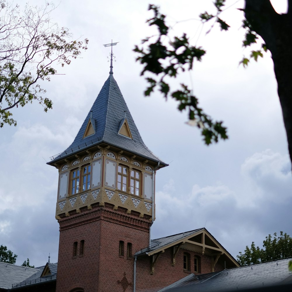 a tall building with a cross on top