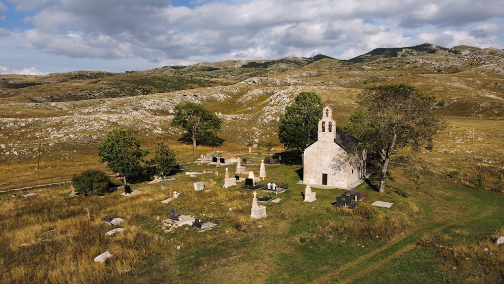 a cemetery with a stone building