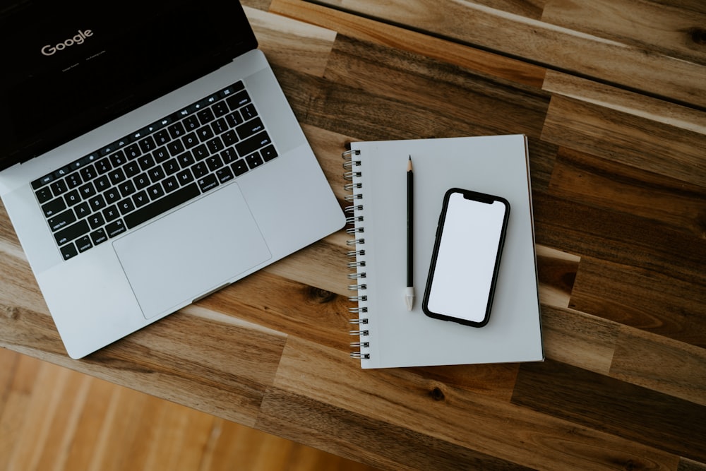 a laptop and a tablet on a table