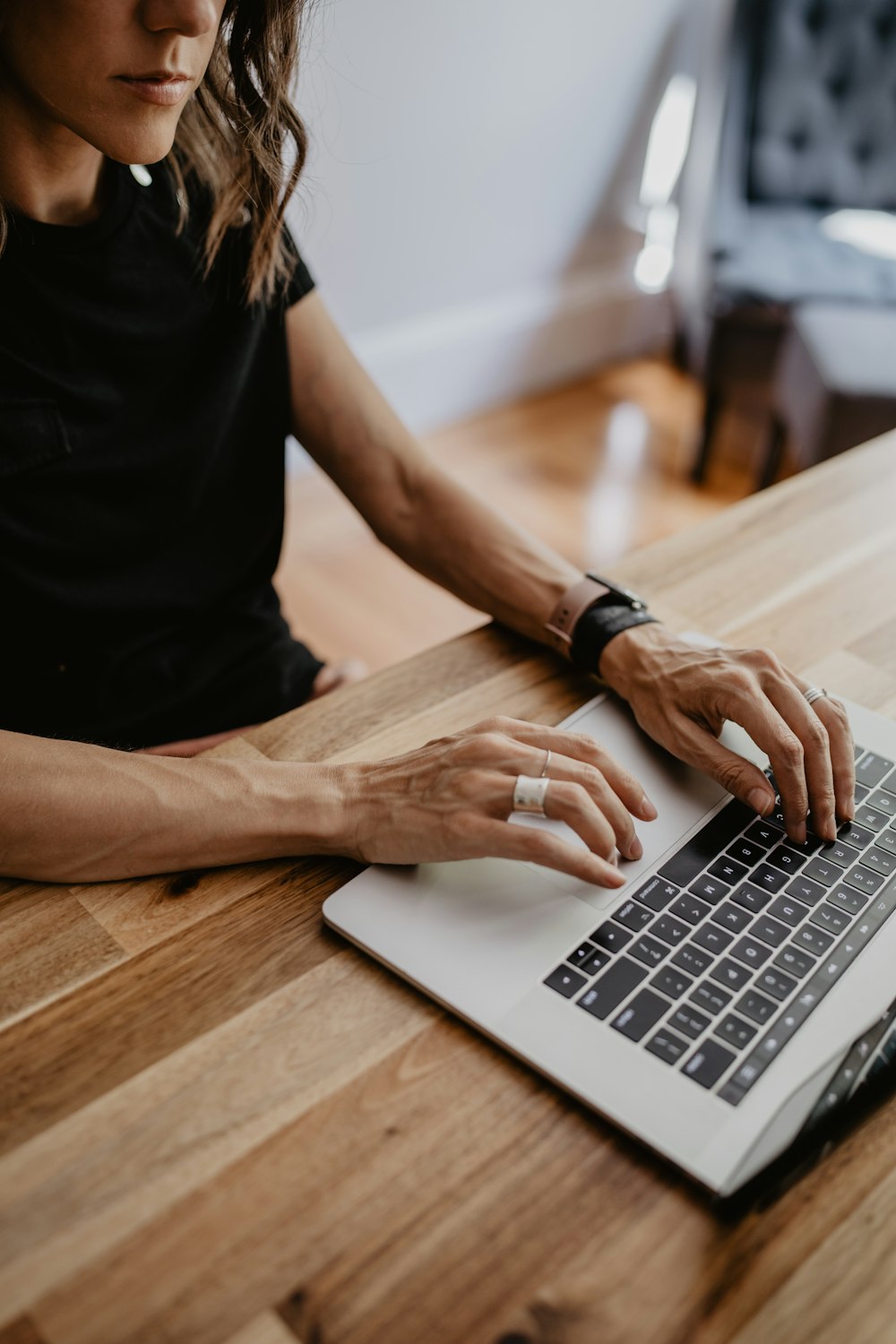 a person typing on a laptop