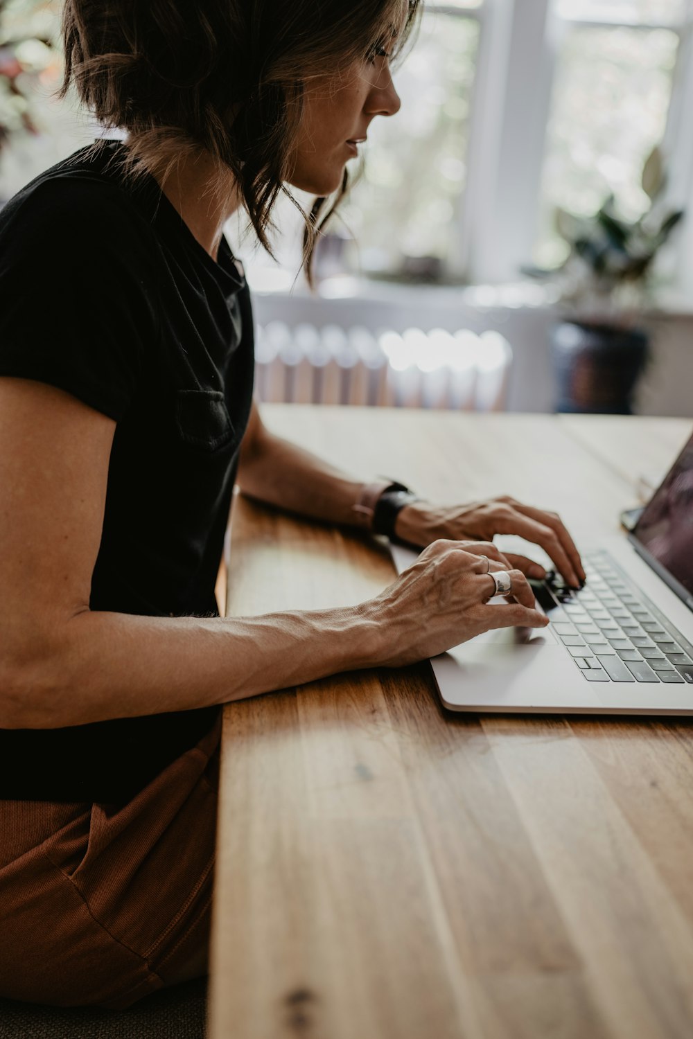 a woman using a laptop