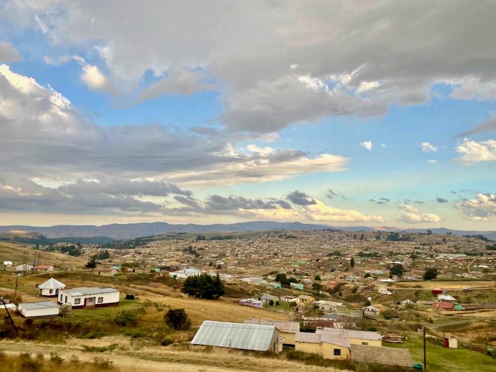 a landscape with buildings and trees