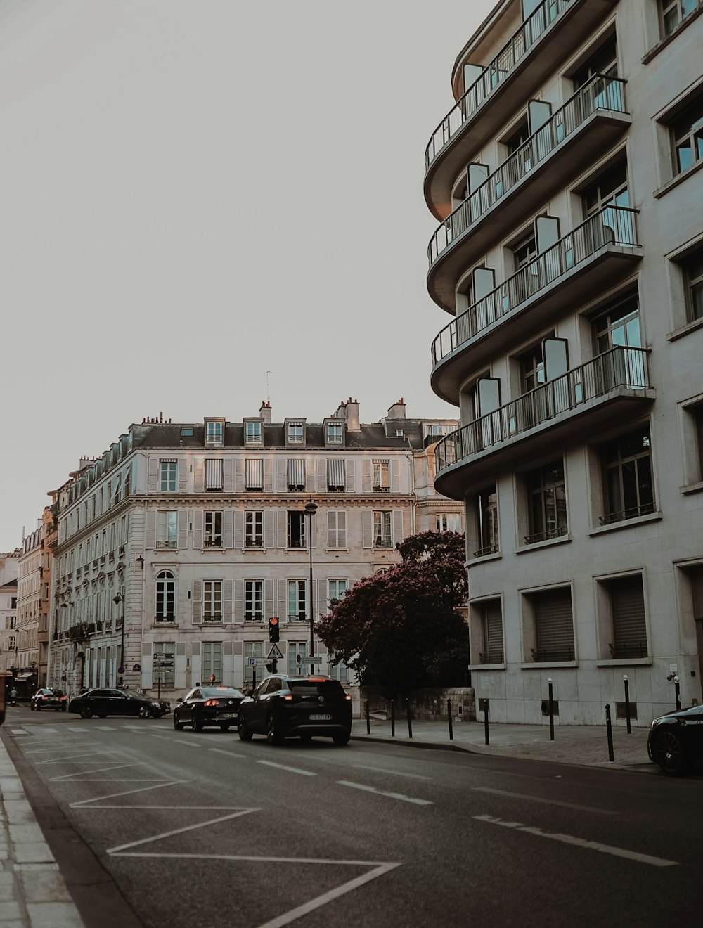 a street with cars and buildings on either side of it