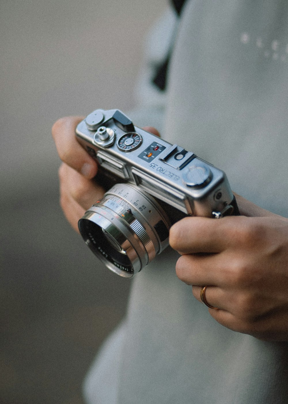 a person holding a camera