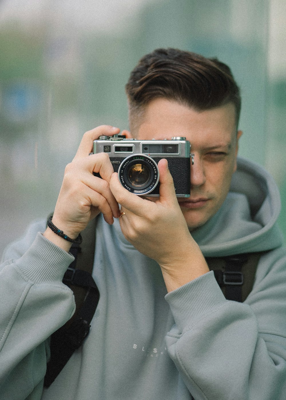 a man holding a camera