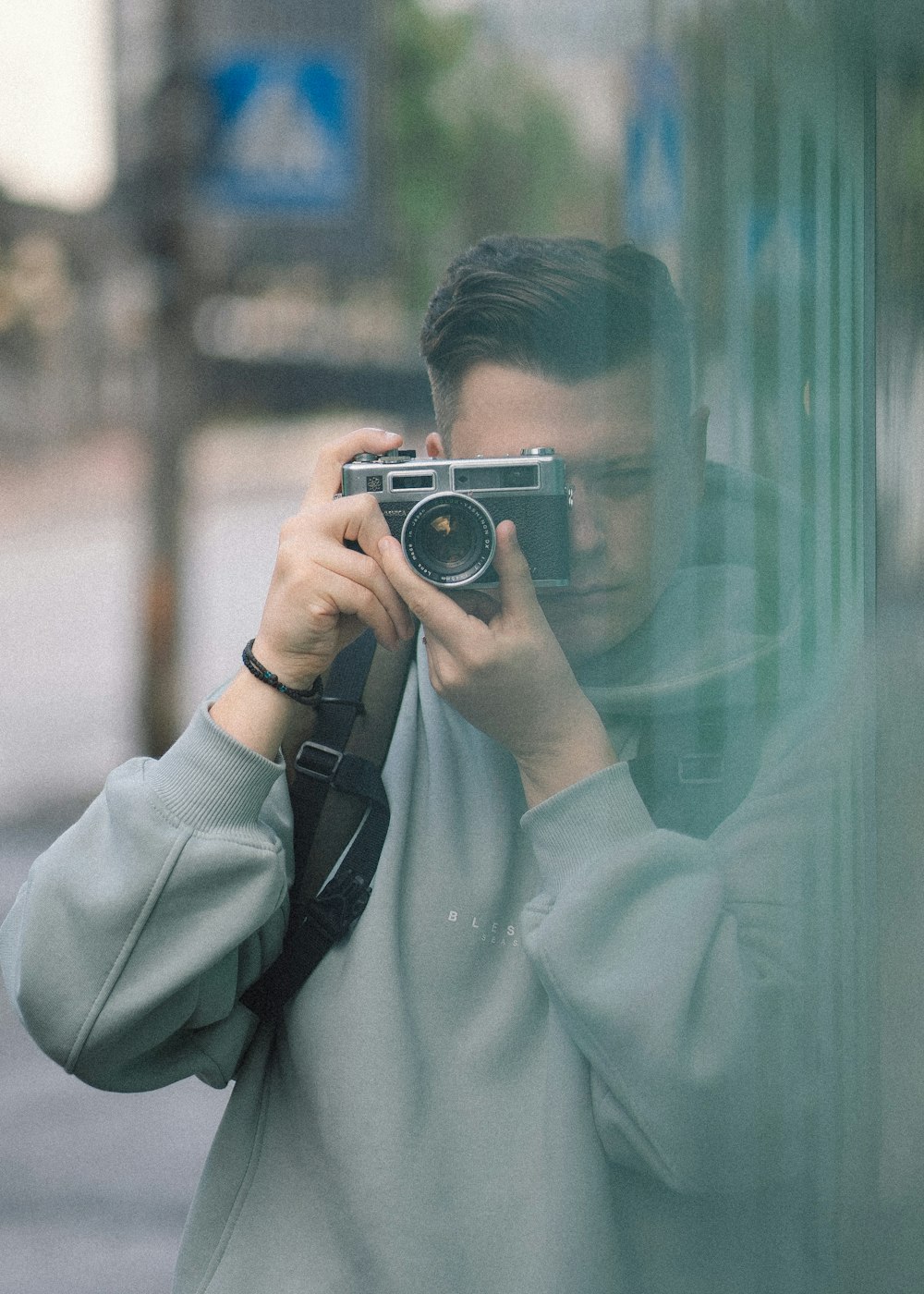 a man holding a camera