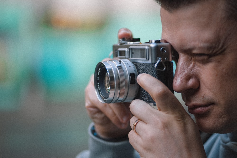 a man holding a camera