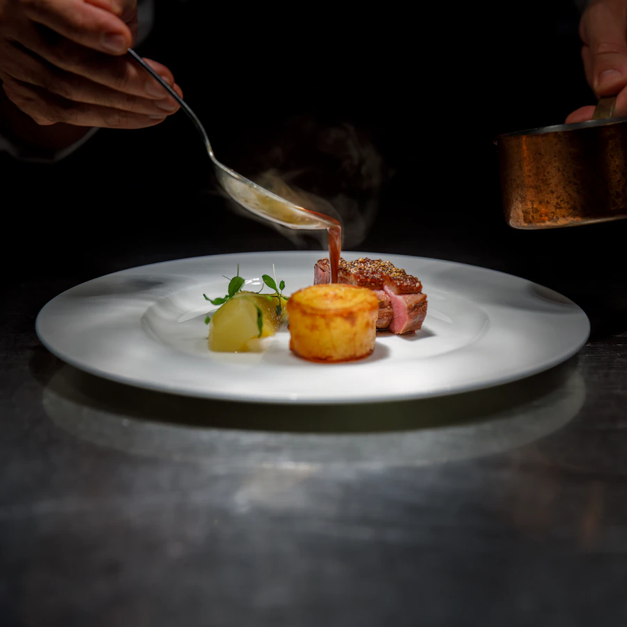 Chef finishing a fine dining plate