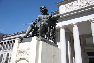 a statue of Velazquez outside the Prado Museum in Madrid