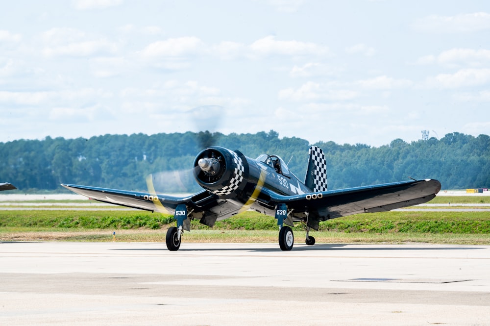 a small airplane on the runway