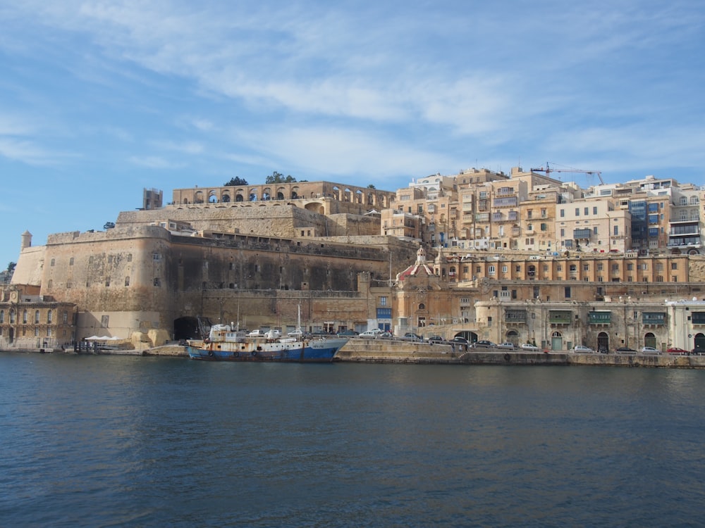 a body of water with buildings along it