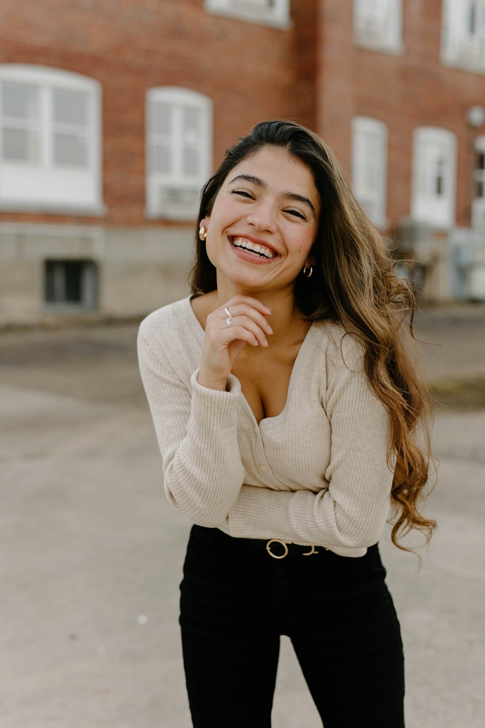 a woman smiling and posing