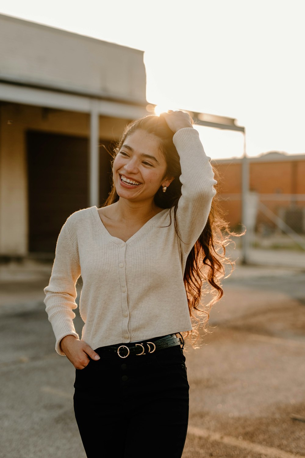 a woman with her hair blowing in the wind