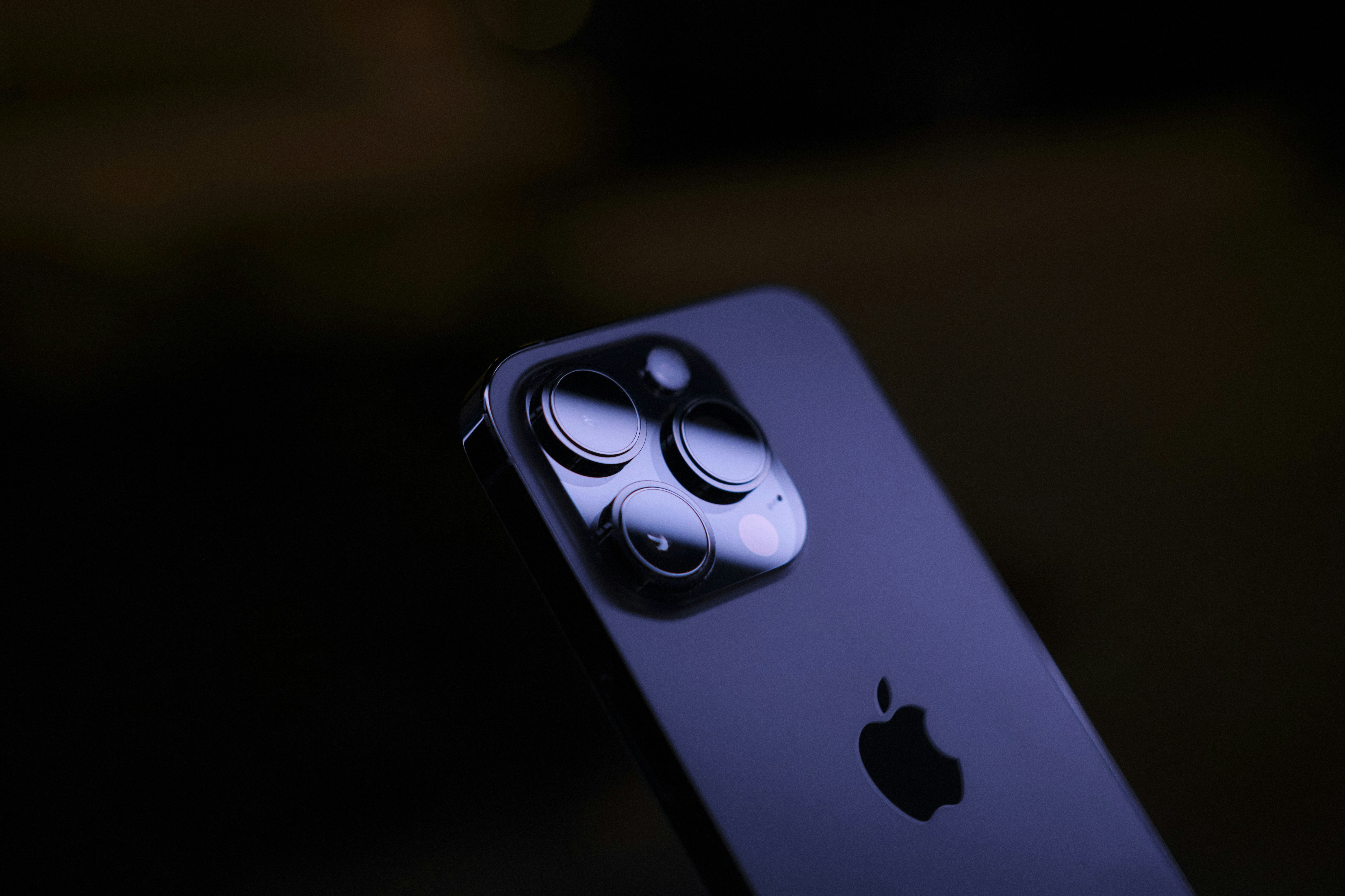 iPhone under neon lights