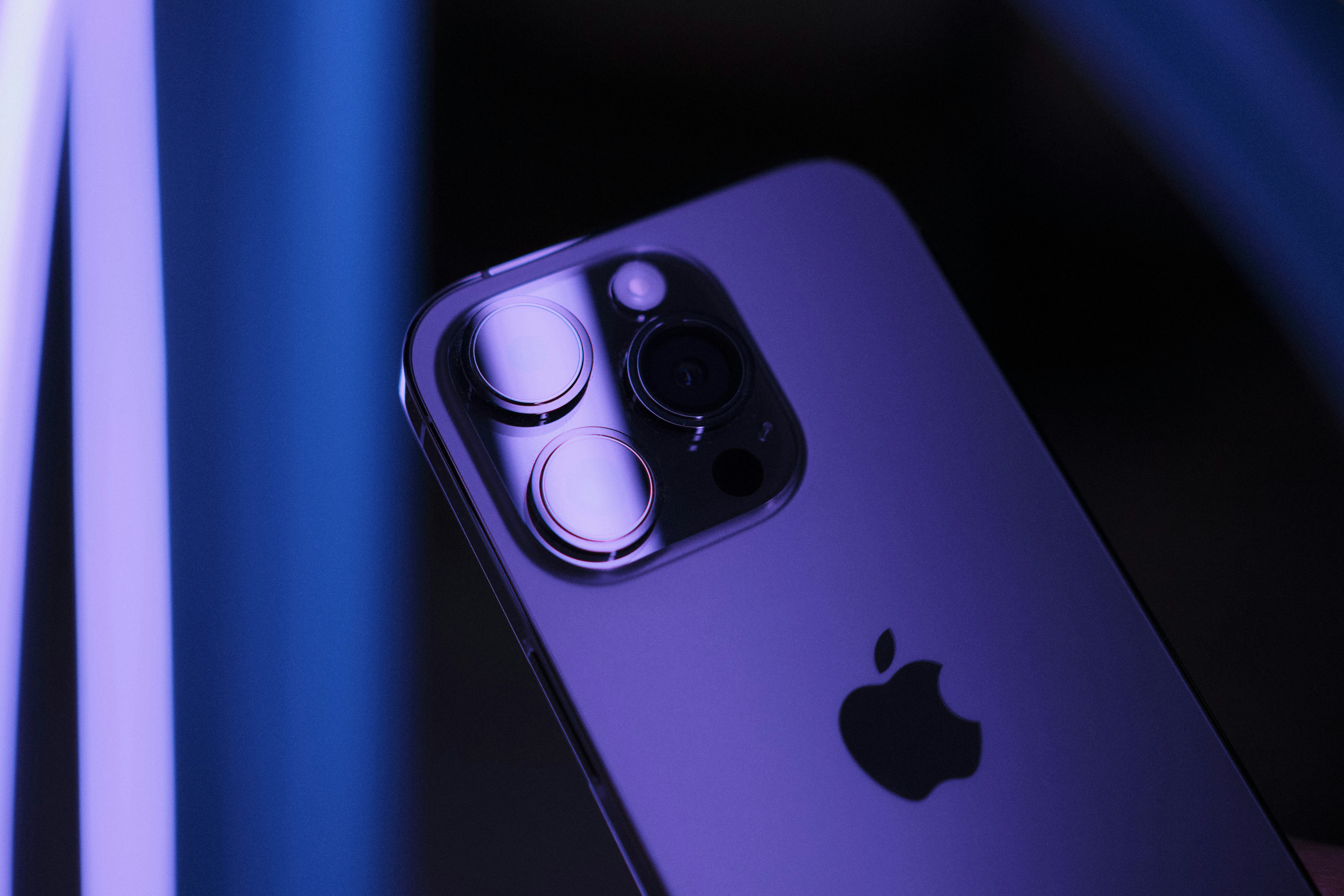 iPhone under neon lights