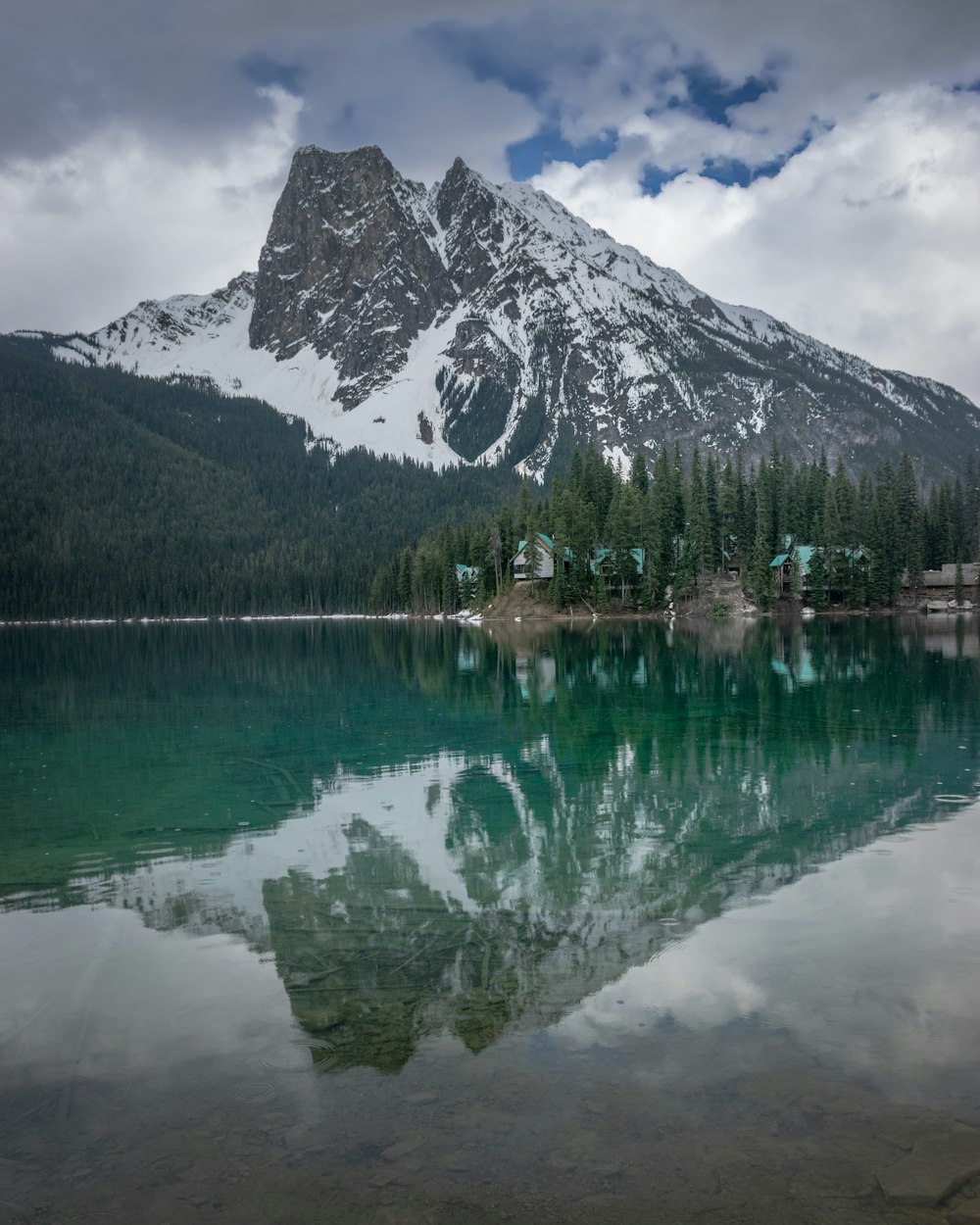 a lake with a mountain in the background