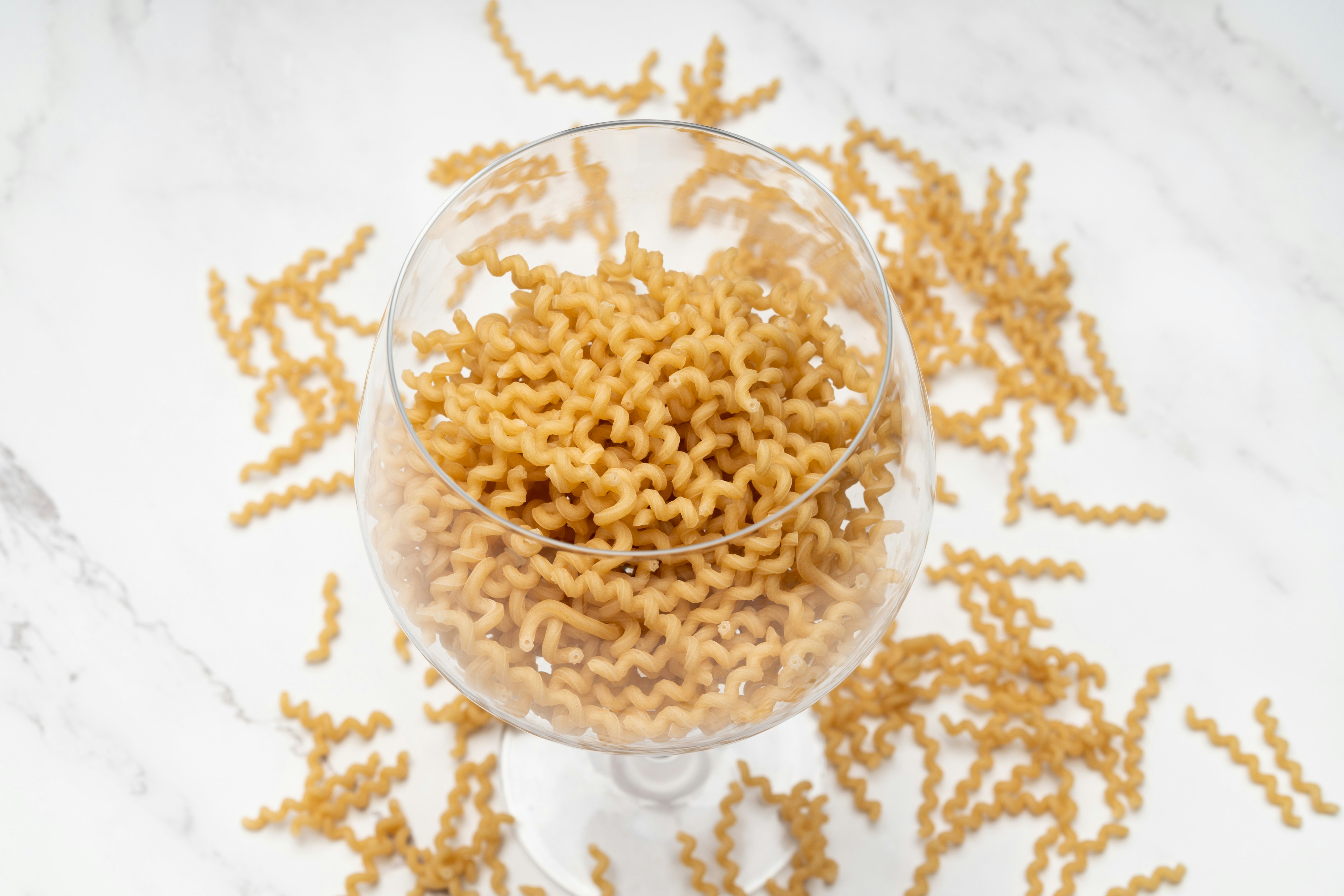 a glass bowl of popcorn