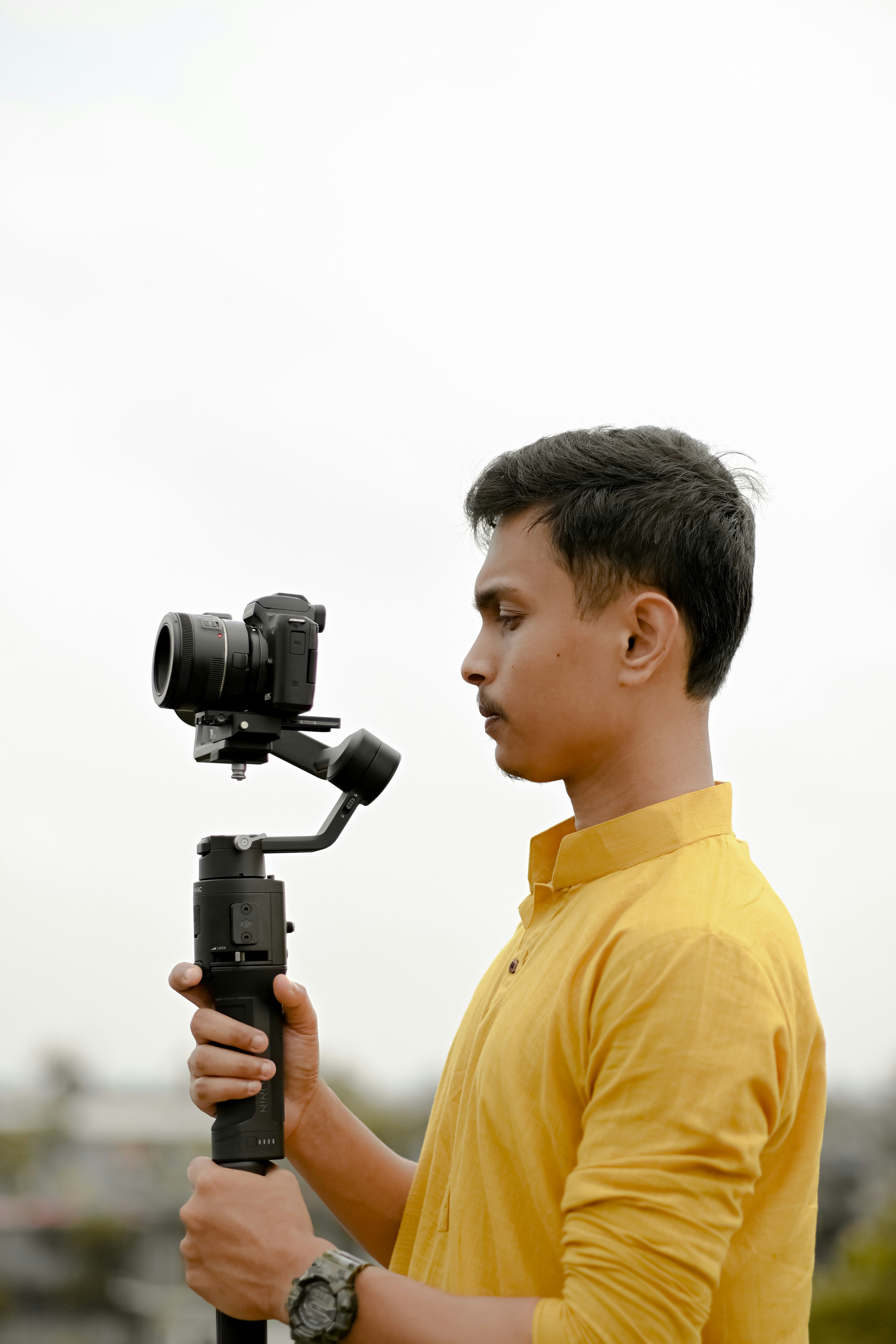 a man holding a camera