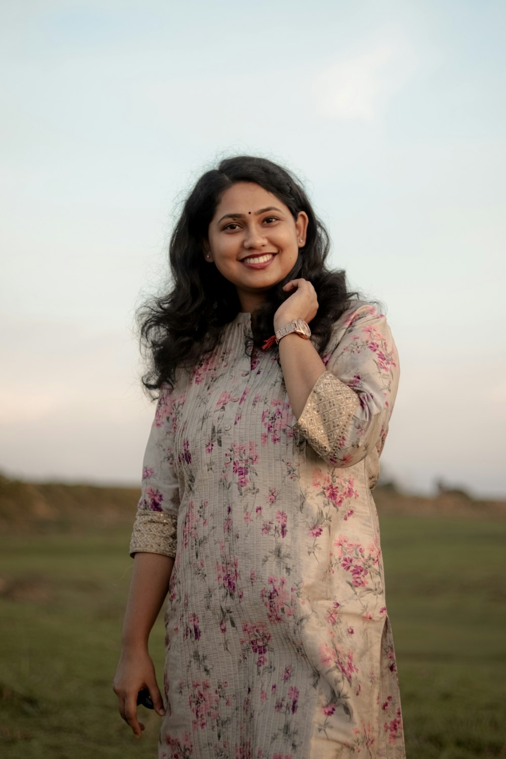 a person in a floral dress