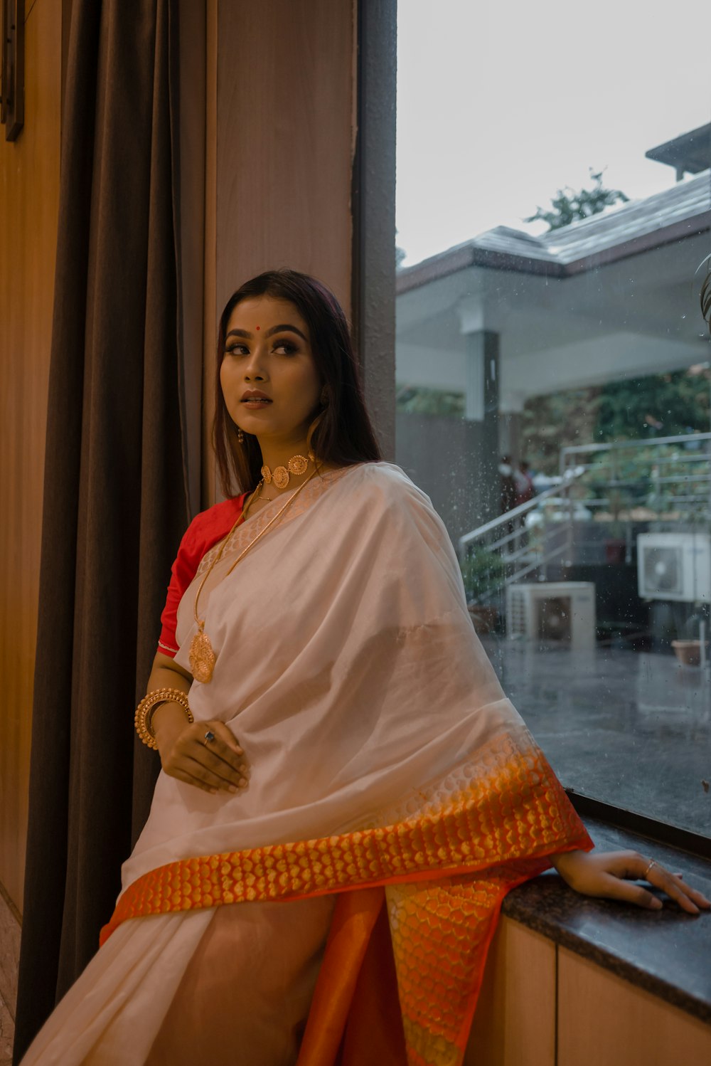 a person in an orange dress